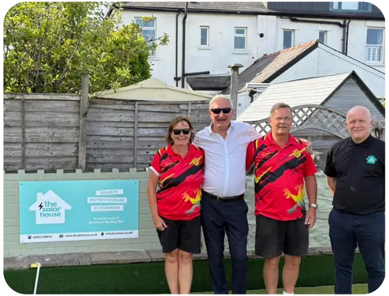 The Solar House team with players from a local club they support