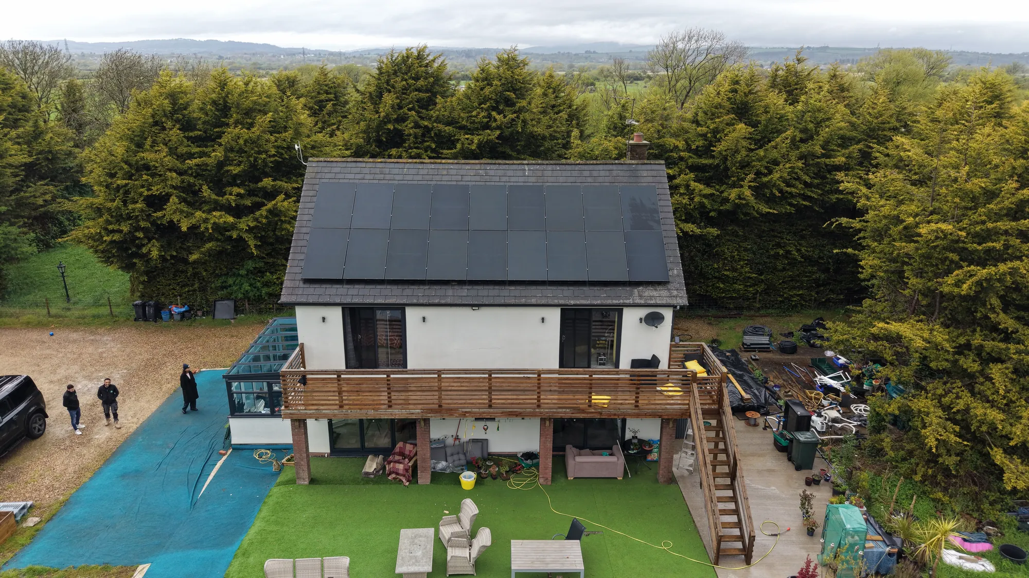 Drone view of the house in Marshfield with 18 AIKO panels on the roof
