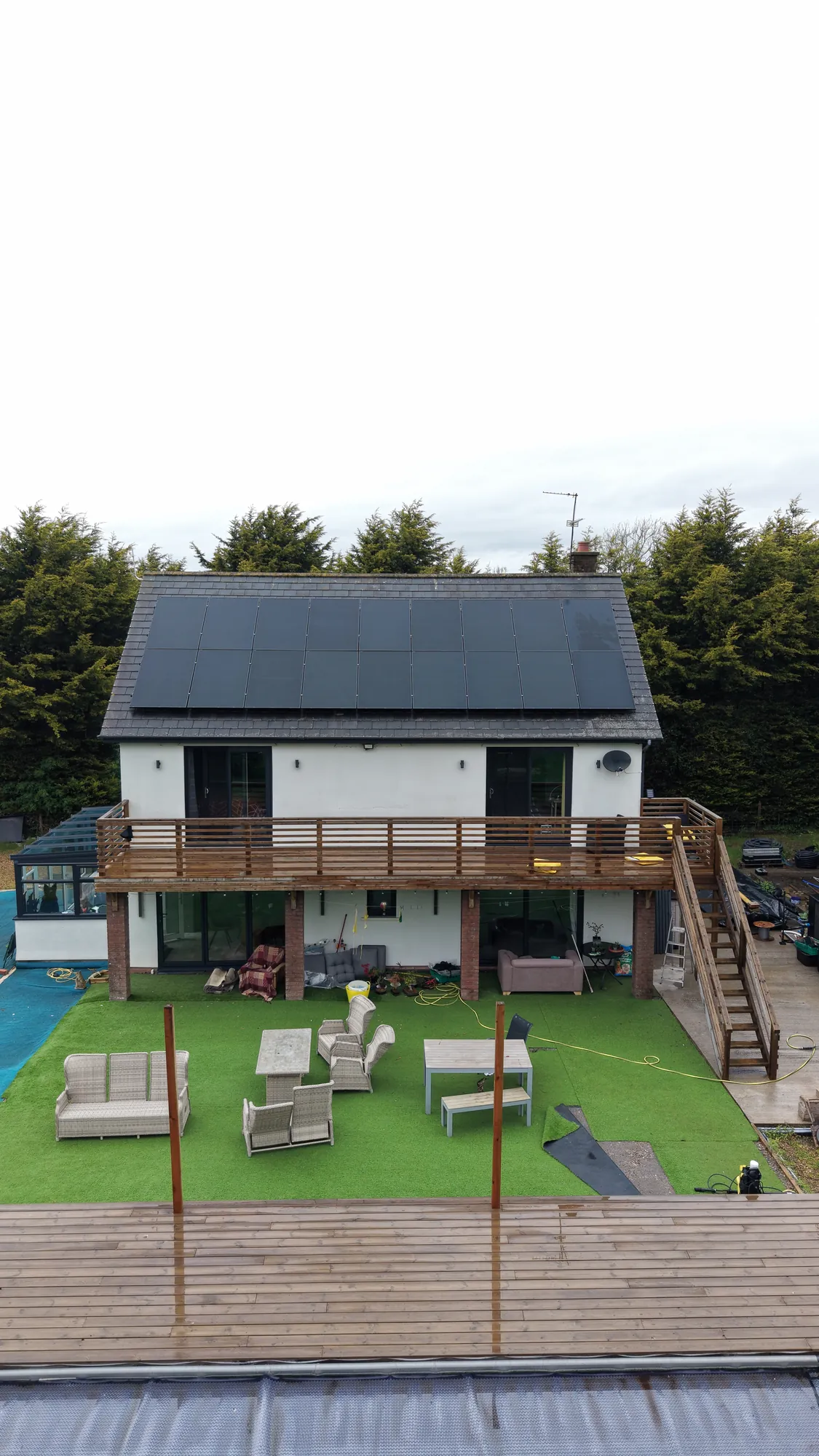 The finished roof from above, looking over the garden and pool