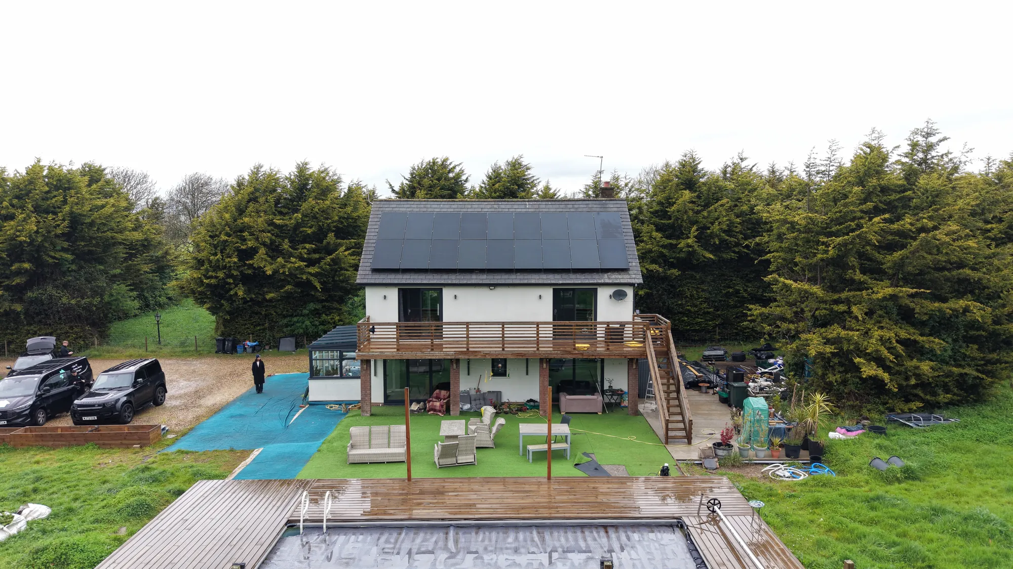 The house and solar roof seen from the far end of the garden