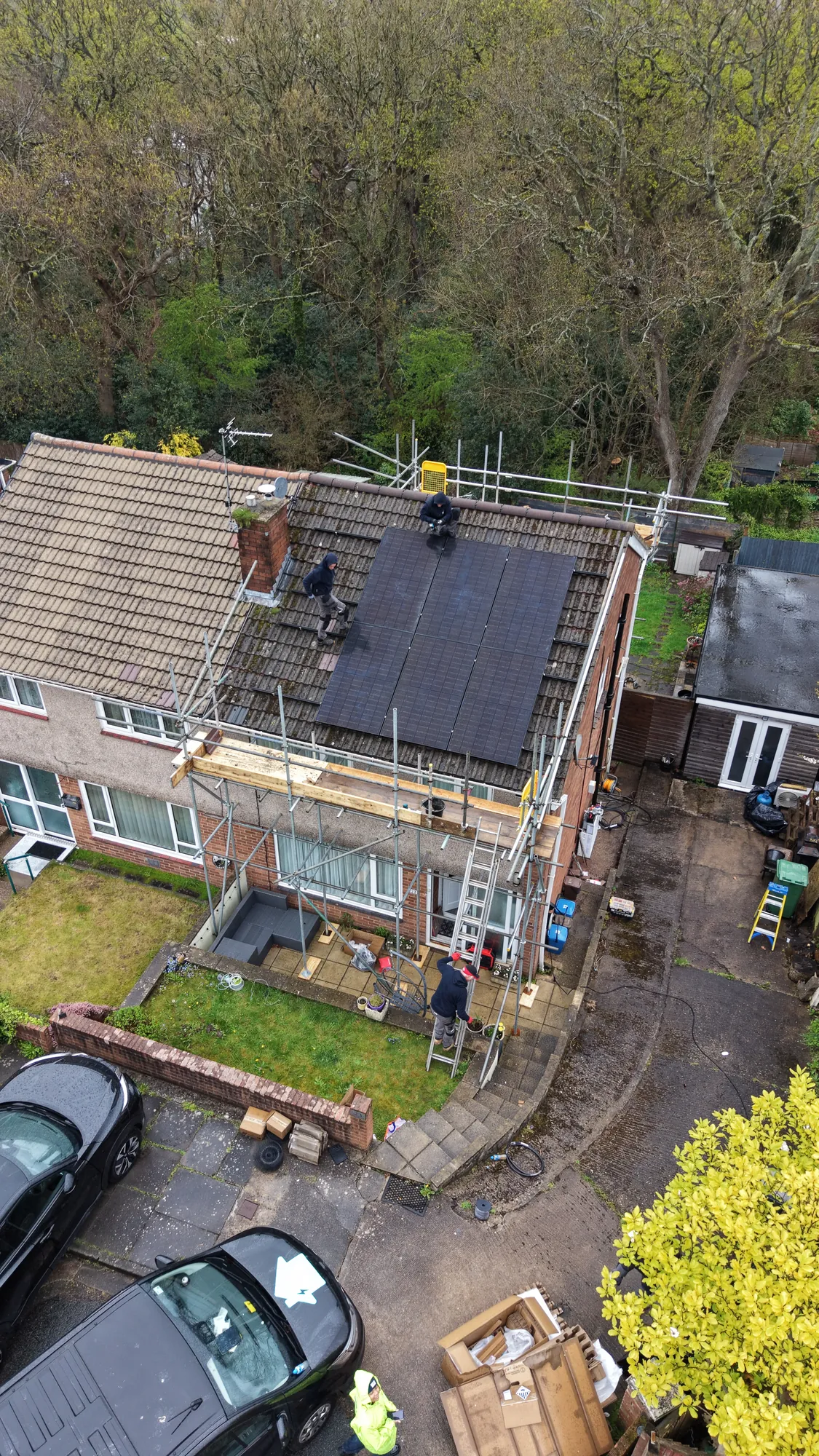 Looking down on the roof as the panels go on
