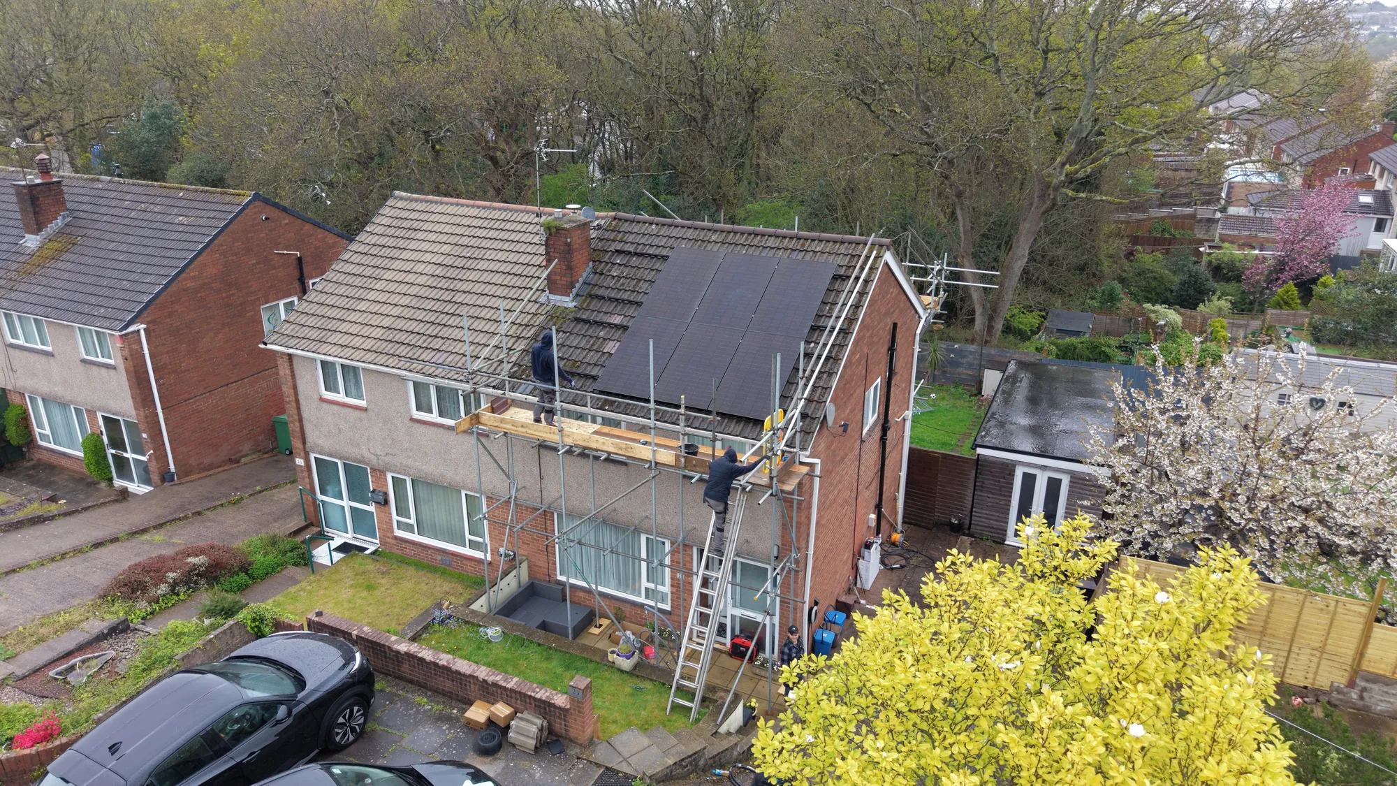 The installation part way through, panels going on the rear roof