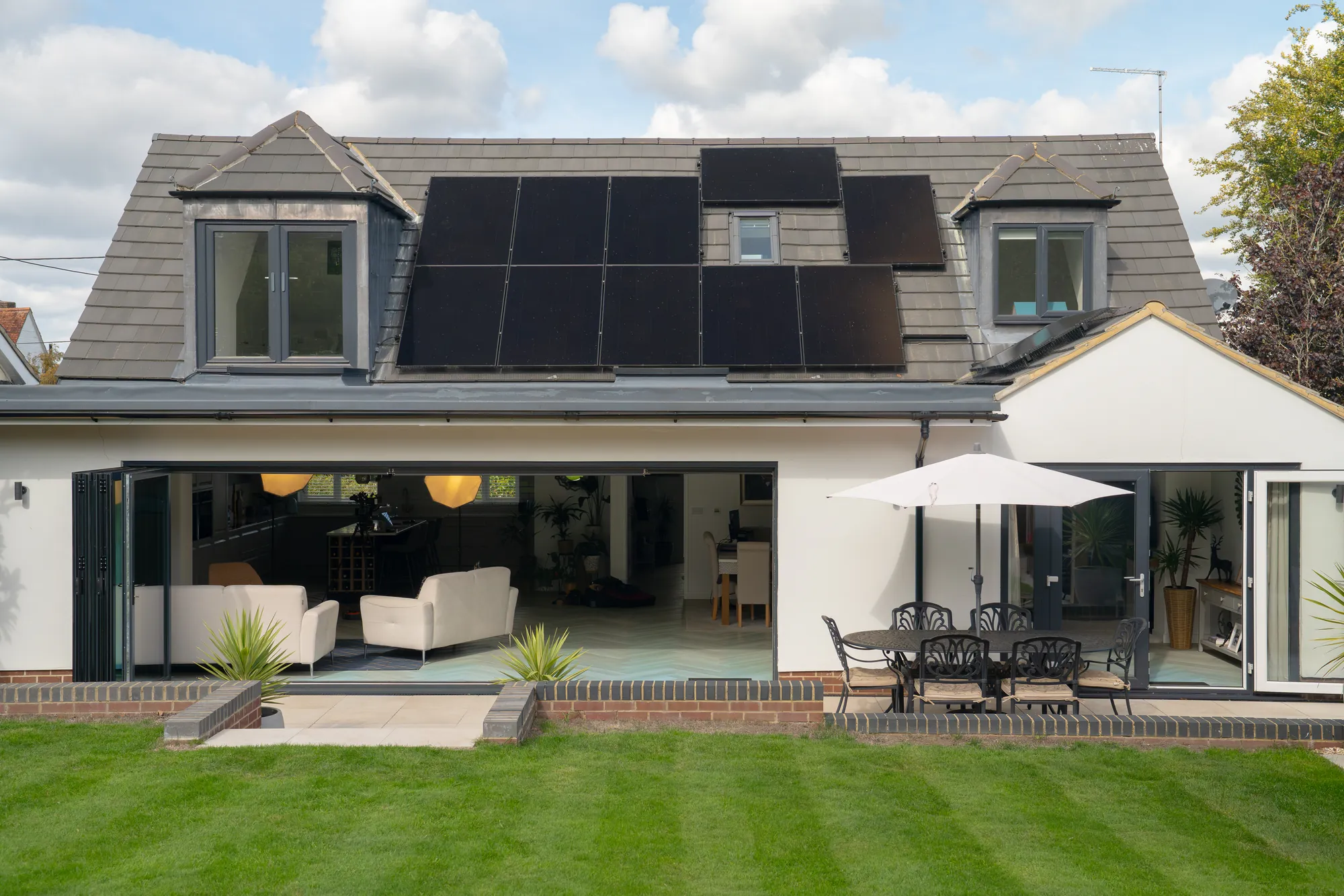 The back of the bungalow in Westbury with LONGi panels on the roof