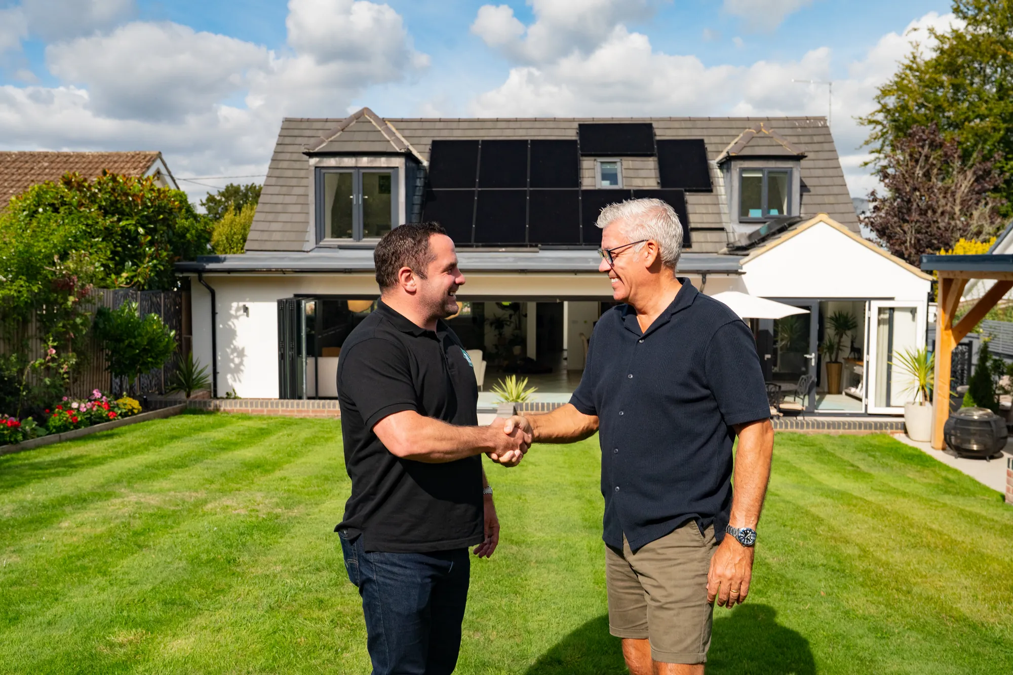Shaking hands with the homeowner in the garden