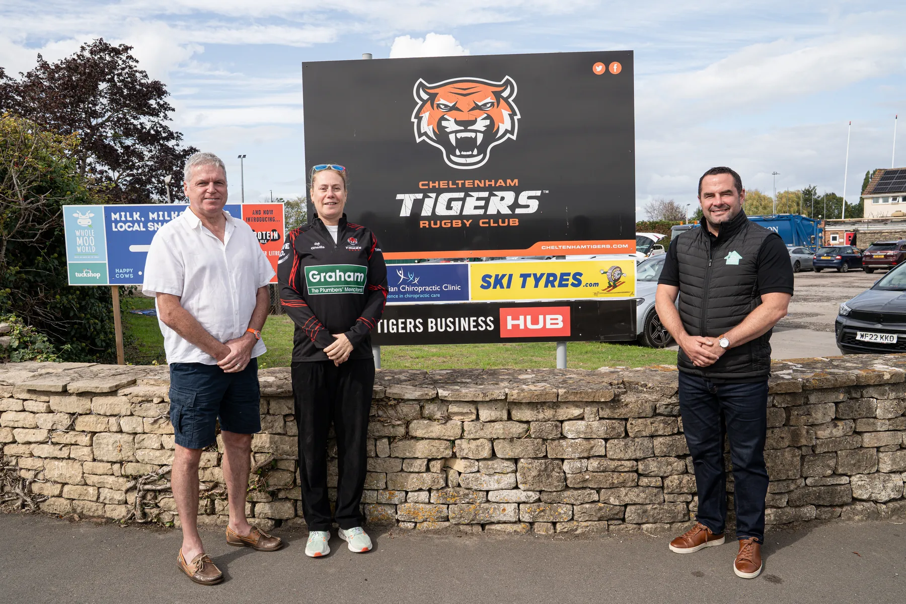 The Solar House team with Cheltenham Tigers at the club sign