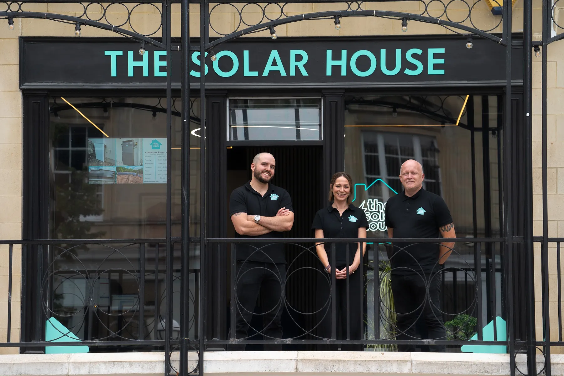 Three of the Cheltenham team on the balcony outside The Solar House showroom on Montpellier Street